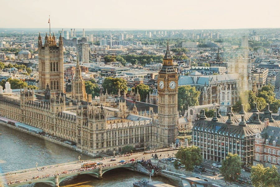 Aerial view of the Palace of Westminster, a group of gothic revival buildings.